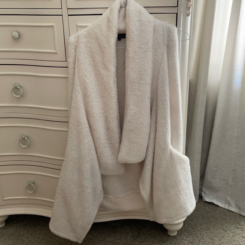 White fur cardigan. So comfy and will keep you warm this winter! With pockets